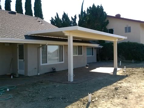 metal patio attached to house|attach patio roof to existing house.